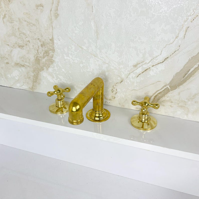 Widespread Bathroom Faucet With Cross Handles