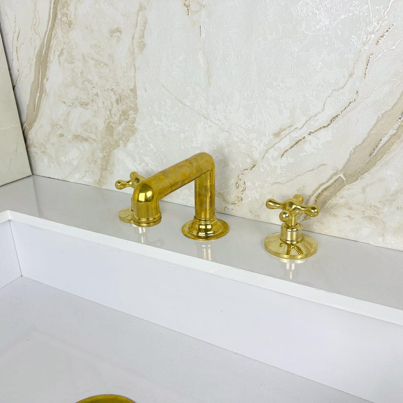 Widespread Bathroom Faucet With Cross Handles