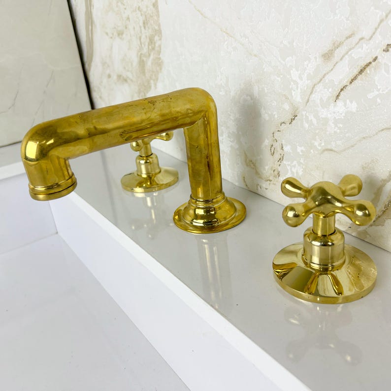 Widespread Bathroom Faucet With Cross Handles