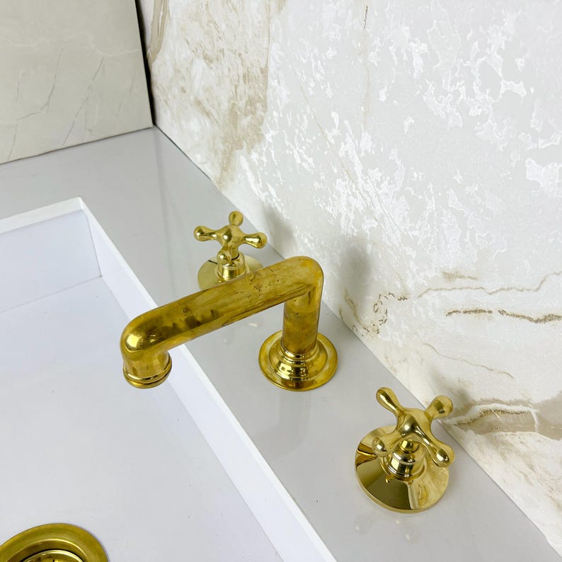 Widespread Bathroom Faucet With Cross Handles