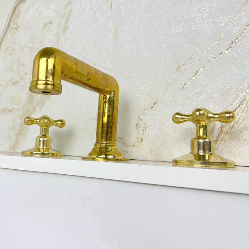 Widespread Bathroom Faucet With Cross Handles
